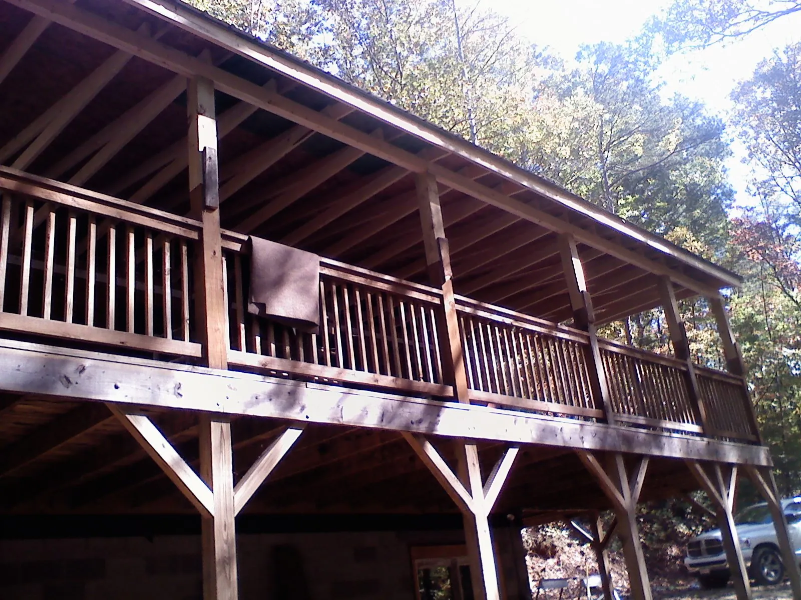 Timber framing under a new elevated porch and deck — Roof Leak Repair in Bear Creek by Roofing Brothers